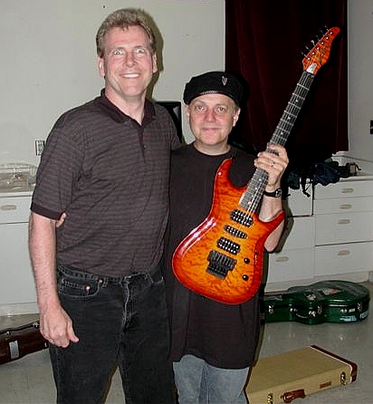 My custom guitar, and Phil Keaggy - This photo is of Phil Keaggy's concert in 2002, where he played my custom Zion guitar, shown here. On the left is the guitar's designer, Ken Hoover, prior owner of Zion Guitars. Ken now works at another company called Moriah Guitars. Check out both sites at zionguitars.com and moriahguitars.com