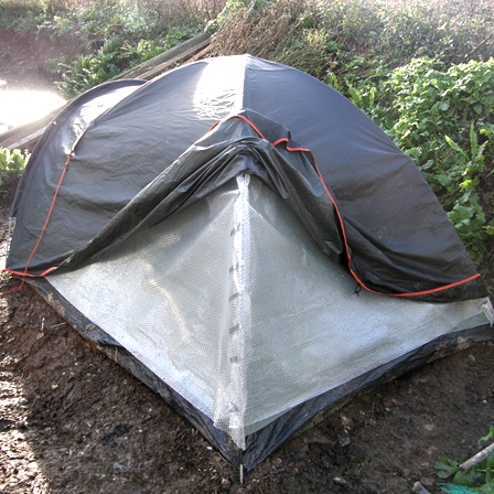 Tent With Bubblewrap sandwich - How to make your tent warm in winter!  Put a layer of bubblewrap between the inner and outer tent.  This will help keep the rain out and also provide a layer of insulation to keep you warm on frosty nights and when the snow covers your tent.  This picture shows the bubblewrap layer.