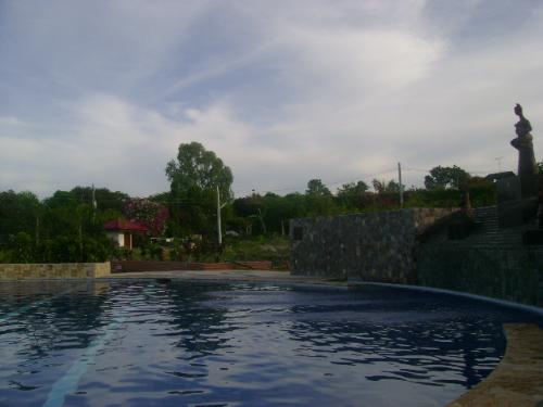 swimming pool - the Bravo golf swimming pool in Sibulan, Negros oriental, Philippines. the water is warm good for a relaxing swim
