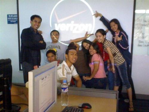 technical support team - me and my team with verizon hdsl logo at the back.