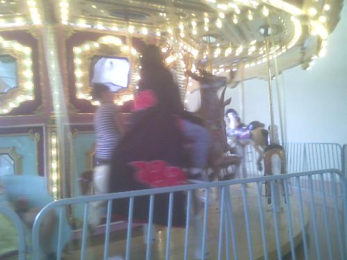 bad pic of Itachi on the carosel - another day at the Mall for the Akatsuki