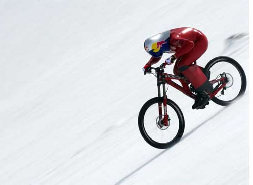 World record speed on mountain bike - Markus 'Hercules' Stoeckl beating the world record speed on a mountain bike with a speed of 130.7 mph (210.3 kmph). Wicked!