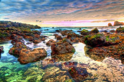 Rocks of Siung - The rocks of Siung Beach, one of a series of beautiful beaches in Siung, Wonosari, Jawa Tengah. You can find beautiful white sand, shallow coral reefs on rocks, myriad of small sea creatures, sea slugs, and high rising rocks here.  The technique used here is High Dynamic Range photography :)