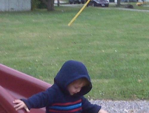 Luisito - this is my son Luis, named after his father Luis. He's playing at the park near our house.