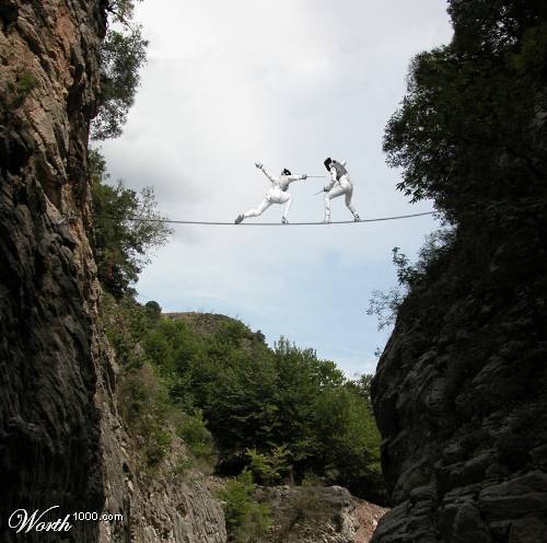 Men fighting in air - Two men fighting on a rope in air. How foolish they are, both will die falling down.