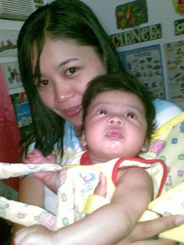 mommy and gwen - it was taken by my student's in the school where i used to work as a school teacher. My baby this time was 3 months. we were invited to their founding anniversary as my husband was one of the judges for their singing contest.