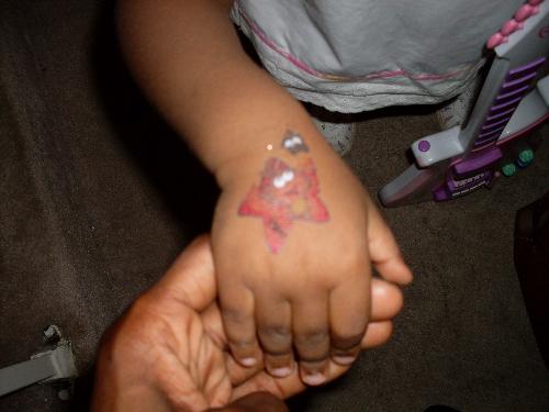 pretty - My youngest daughter showing off her hand art.
