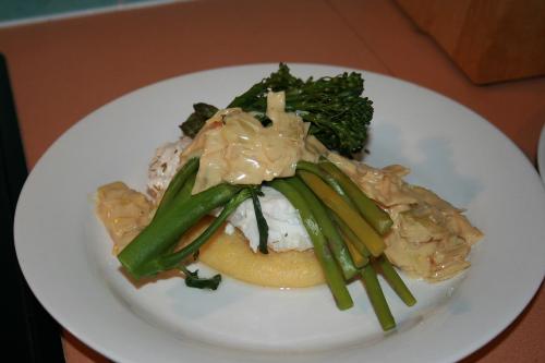 fish dinner - this was a piece of fish that a mate caught and i cooked up at home to tease him back by telling him that i cooked it with soft polenta, creamed leek, brocolini and asparagus spears!