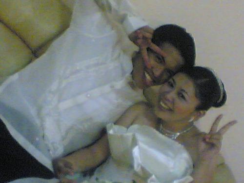 our wacky pose after the wedding ceremony - we got married april 20, 2008 by the age of 23... We were still very young to get married... As a proof of how young mind we are still I posted this wacky picture that was taken after the wedding ceremony. Instead going on a honeymoon we spend the evening with friends.