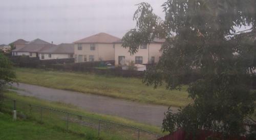 Effects after a heavy rain fall - Empty field used as a drainage that looks like a river after a heavy rain fall.