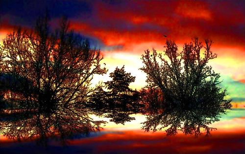 gamma sunrise - once upon a time when i was in school and up really early as is usuall with school i took this picture for the purpose of i have no idea but it turned out to be just the picture to make into an abstract doomsday looking world with my cheap but fun photo manipulation program.