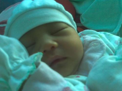 My baby after release in the hospital - my daughter here was just a week old. She was confine in the hospital for a week since she was premature.
