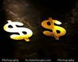 gold dollars - two gold dollar symbols gold dollars - two gold dollar symbols