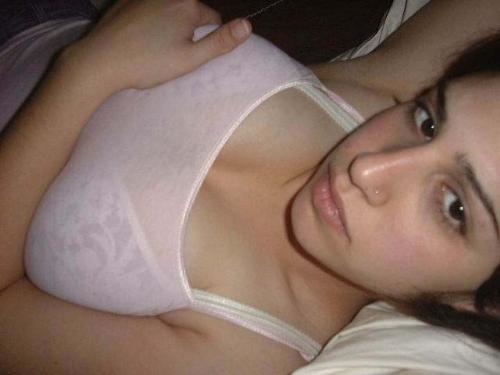 hot sexy pakistani girl - hot pakistani girl posing while laying on bed