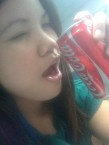 phew. im thirsty! - this was taken during my break... went to the pantry and had this COKE for snack!! ahaha... sugar rush people!!