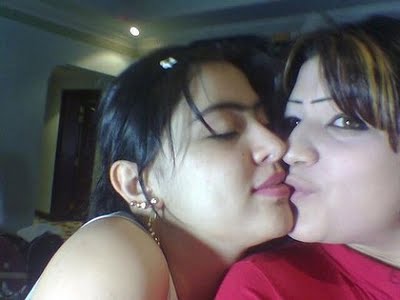 girls kissing - these two girls love each other and kissing passionatly .