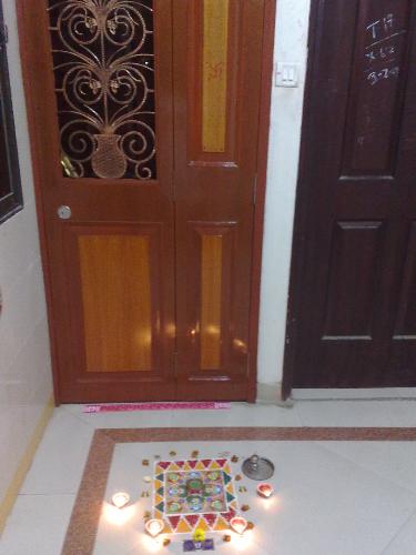 Diwali Rangoli - Rangoli, designed outside the door, to welcome goddess Lakshmi into the house during the biggest Indian festival, Diwali.