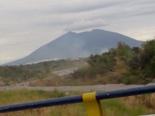 Mounta Arayat - This is Mount Arayat as viewed along Abacan bridge located in Angeles city, Pampanga. It is a dormant volcano with no recorded date of eruption and is located between Magalang and Arayat also in Pampanga. There's a picnic site at the foot of the mountain and is worth a visit.