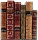 Stack of neat looking books - A row of neat looking, well bound books sitting on a shelf