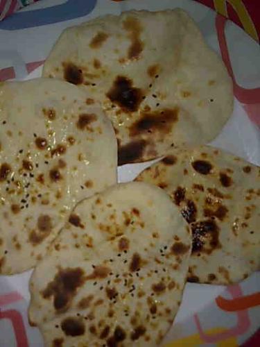 Naan - Naan is a South Indian Roti which is made out of wheat flour.