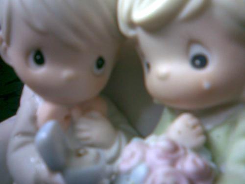 wedding - an miniature image of two individuals tying the knot.