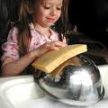 child - child doing some household chores. The best way to raise a child