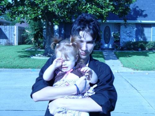 Granddaughter and Son - My youngest son, hold my grand daughter.