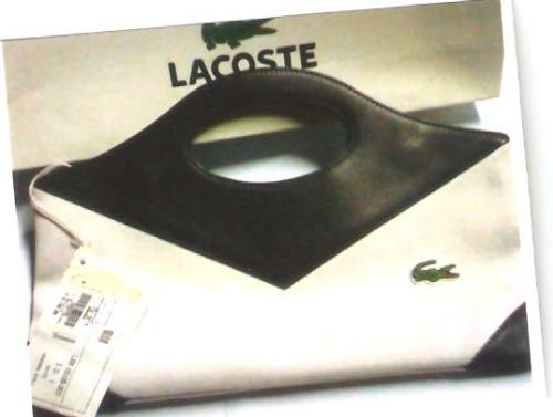 RUSH SALE!! Original Lacoste Handbag at 50% - Brand new Lacoste Bag for rush sale now at 50% off the original price. Original price is set P6,500 now you'll get at 50% off! Hurry, Limited edition bag. Paper Bag included!