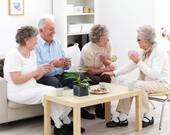 Enjoying life - This group of seniors are having a swell time exchanging te te te. A good example of retirment bliss
