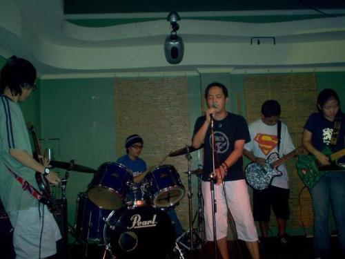Singing - Me and my band performing at a local gig.