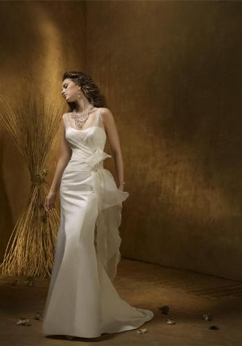 My Wedding Gown - So far among the wedding gowns I see through internet, this is my favorite. I think this the most appropriate if my wedding will be at the beach. Quite dress down but still formal enough...   Right now I'm still searching for my boyfriend's suit...
