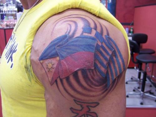 tattoo - Batista's tattoo showing Philippine & Greece flag together...