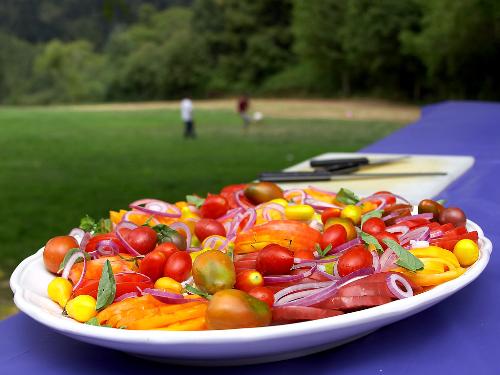 Tomatoes - A assortment of tomatoes on a plate.