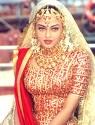 Indian Bride -  In India generally parents choose bride and bridegroom for their daughters and sons. Love marriage rarely happened there. Boys and girls have to marry according to their parents choice. The parents of brides have to give big amount of dowry to the parents of bridegrooms. During marriage the brides have to dressed with golden ornaments supplied by their parents.