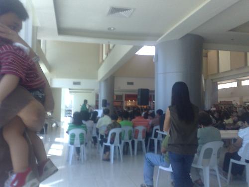 philippines - people of the philippines attending mass at the mall