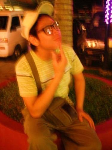 Thinking - Me thinking outside after eating my dinner with my family. Apparently as u can see the picture is quite blurry but it turned out good cause people thought i was korean which in fact I,m not.