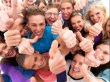 Friends showing victory - Group of friends showing their thumbs up as a part of their victory