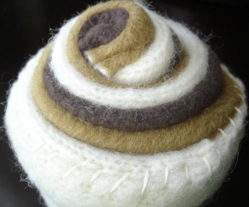 'Cinnamon Bun' Pin Cushion - I made this pin cushion from a recycled sweater, felt, and a cardboard yarn tube. Looks good enough to eat, maybe?