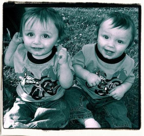 Twins in the prime of life, 1 year old - Twin boys just hanging outside.