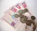 make extra money - a picture of dollar and coins