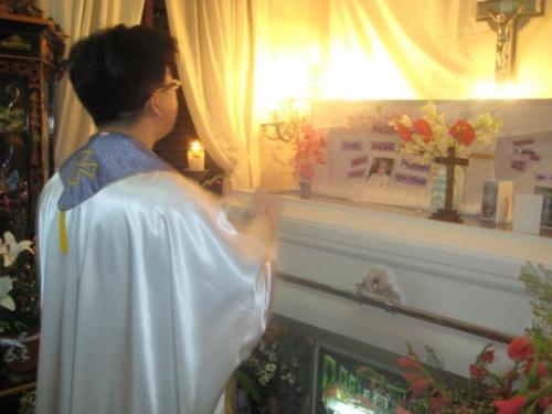 death - dead body blessed by a priest