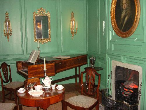 a Georgian drawing room - Gradually back to time you will come across a Georgian drawing room, which is lined with pine panelling from a house in Davygate, which has been painted a fashionable 18th century colour. You can see the silverware, glass and ceramics that are typical of the kind being manufactured in England at the time.