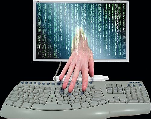 hacker virus hand - these hackers that make a virus and send it through the computer systems to poor unexpecting individuals is really dammed.