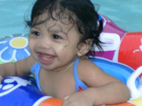 Loves Swimming!!! - my daughter always love swimming. Whether it is a pool or a see. Even just on her air blown kids pool she really enjoyed her time soaking on the water.maybe she wanted to be a swimmer athlet one day!!LOL