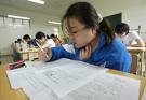 student - a girl giving her exam