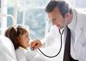 health  - a doctor checking the patient