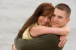 Beautiful couple - The photo shows the love on the face of the couple hugging in the beach