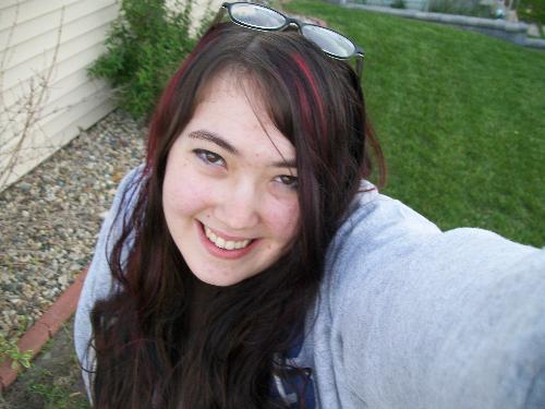 Me! - I was outside on the front lawn, trying to see how I'd look with contacts. Upward angle, my true smile.