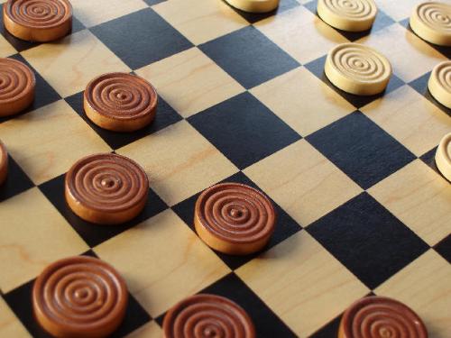 Checkers - Hello this is an image of checker game board and its coins.