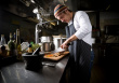 Cook  - This is the photo of a cook preparing a meal